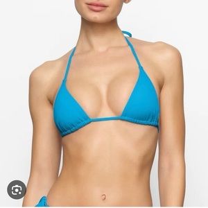 Skims swim triangle bikini top. M. Turquoise. Brand new with tags